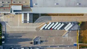 aerial view of vehicles in parking area